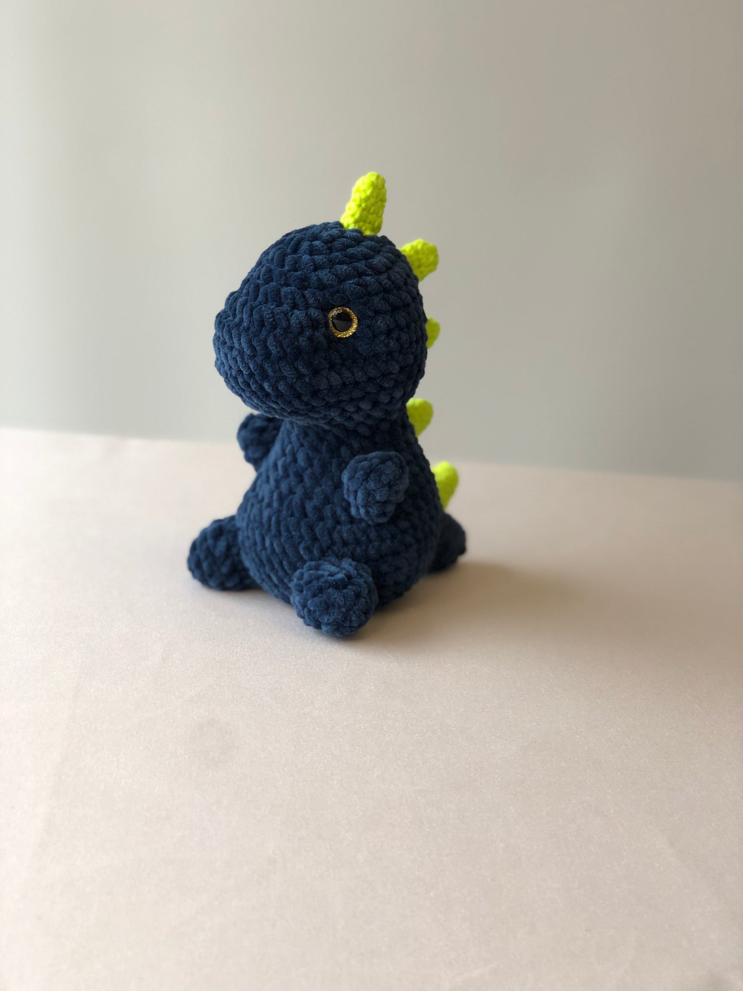 Crochet Plushy Rexy with glow-in-the-dark spikes