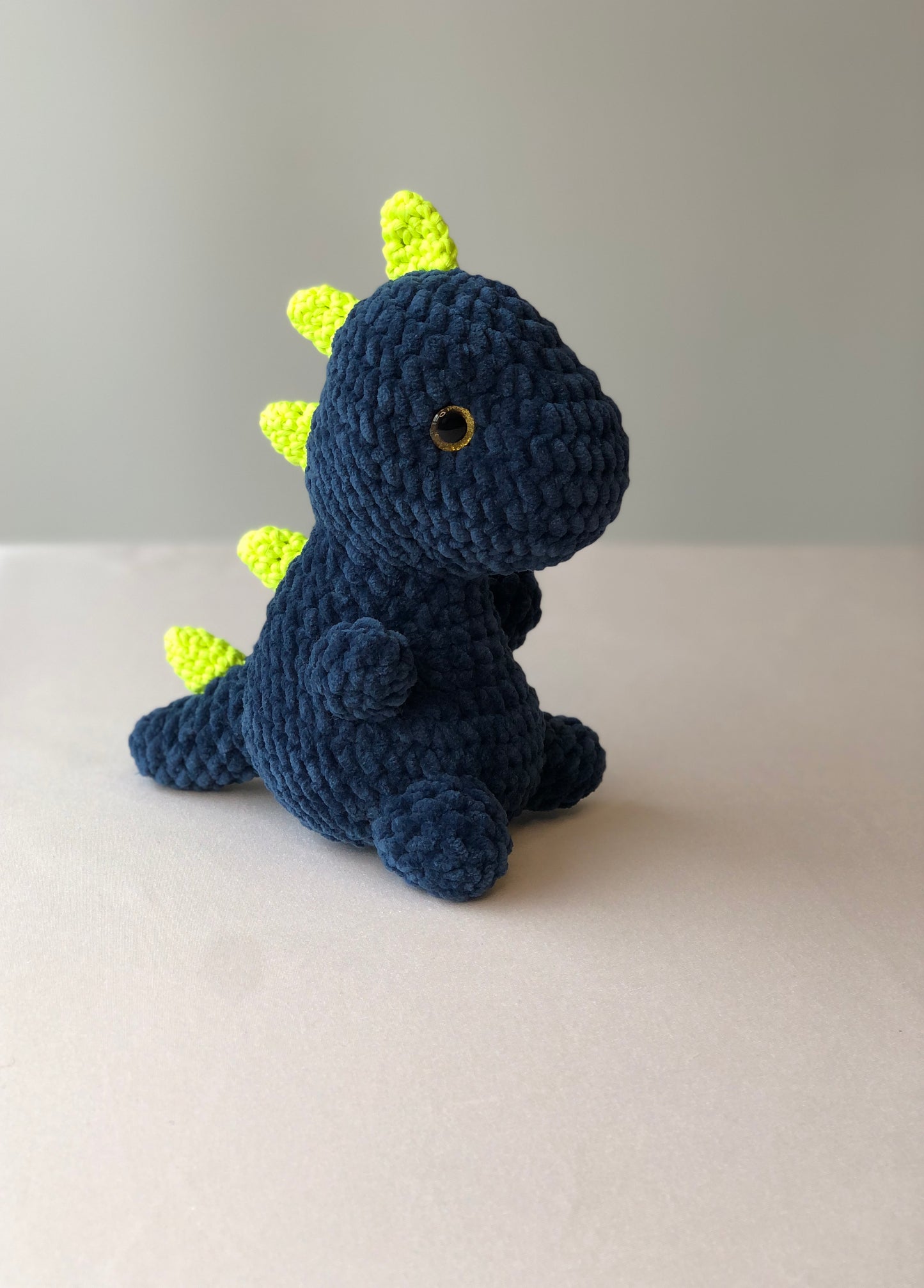 Crochet Plushy Rexy with glow-in-the-dark spikes