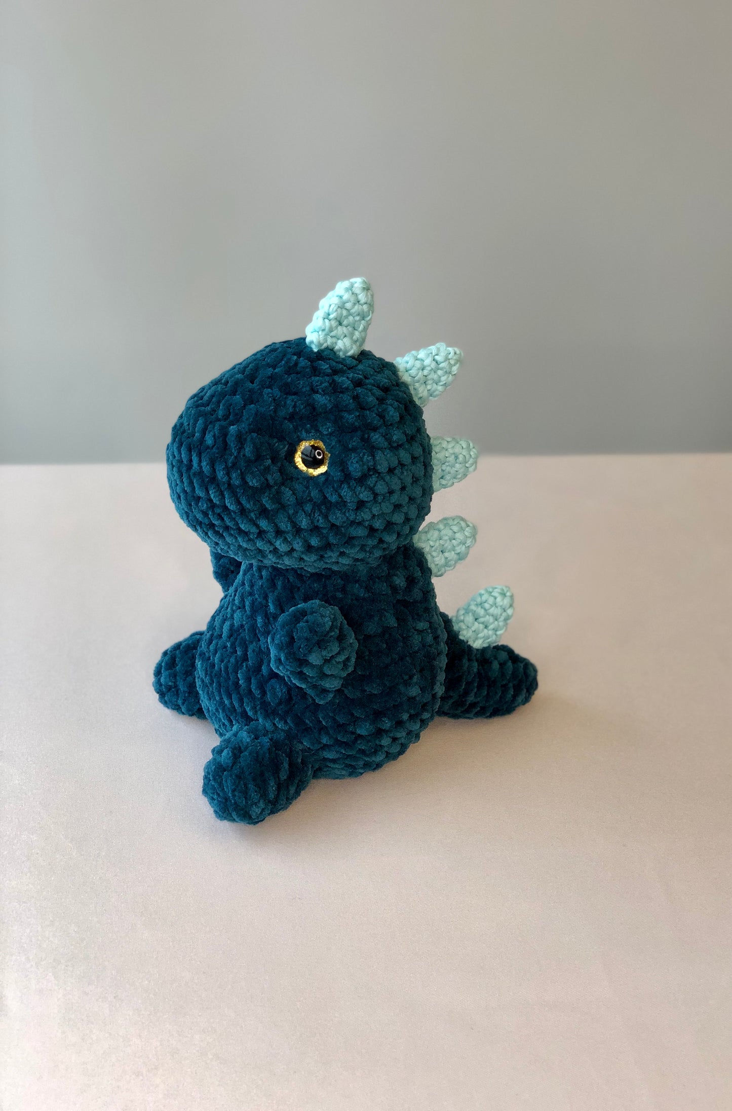 Crochet Plushy Rexy with glow-in-the-dark spikes